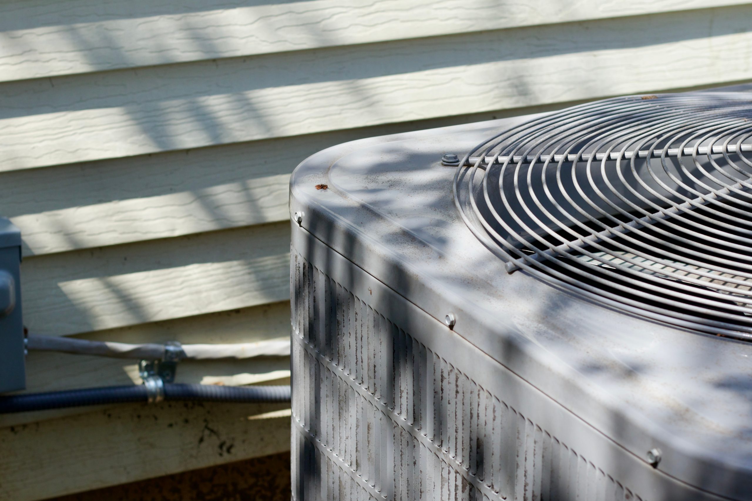 Close-up of an HVAC (heating, ventilation, and air conditioning) unit, showcasing energy-efficient cooling systems.