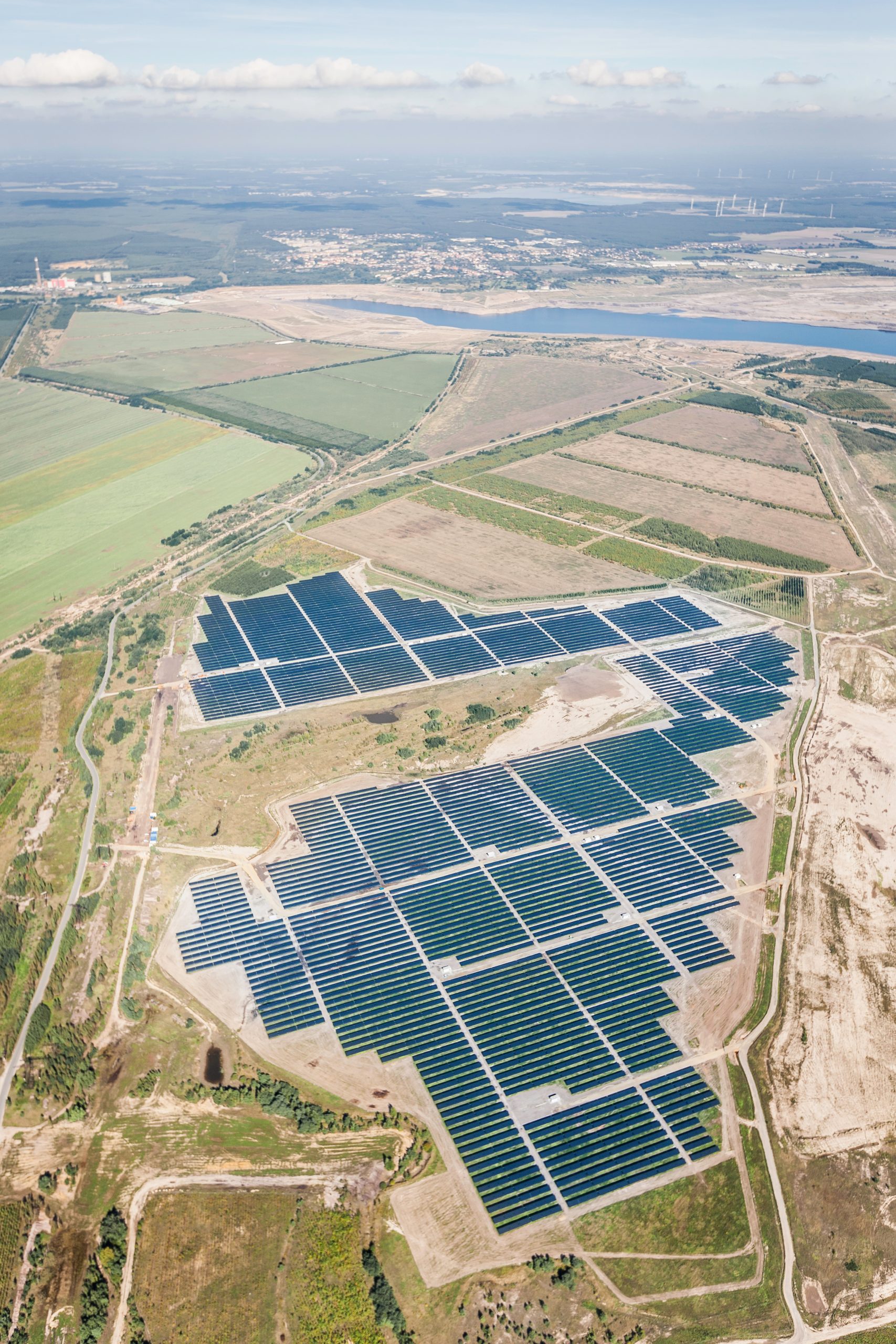 Aerial view of a large-scale solar farm providing renewable energy.